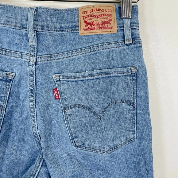 Levi's  Distressed Light Wash 724 High Rise Straight Jeans - Picture 13 of 16